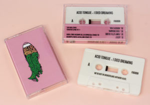 White cassettes with a black on-body print in clear cassette cases with a full colour printed J-card