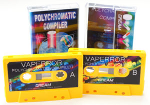 A vibrant set of yellow cassette shells in clear cases with full colour printed J-cards