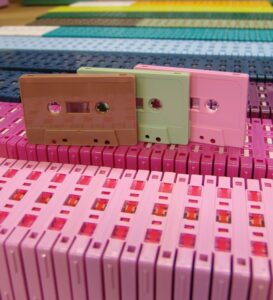 Cassette tape duplication racks of colours