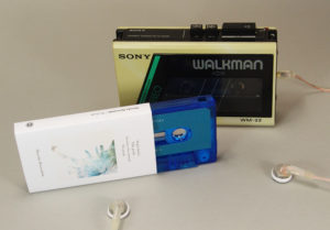 Transparent blue cassettes with sticker printing and matt O-cards