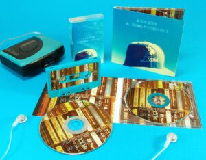 A matching set of four page CD digipaks and turquoise cassette tapes