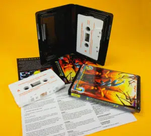 Amstrad computer game cassette with double-height folder cover inserts