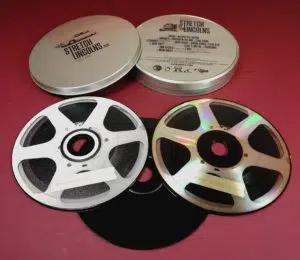 CD tins with top and base printing, plus black base discs with on-body printing