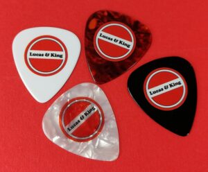 White, white oyster shell, tortoiseshell and black printed guitar picks