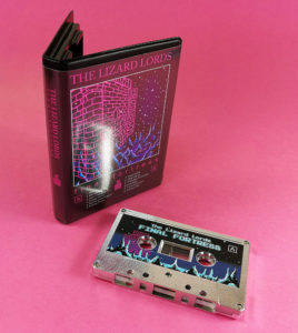 Metallic silver cassettes in black rave cases with full colour inserts
