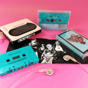 Turquoise cassette tapes with on-body UV LED printing and J-cards with two extra panels