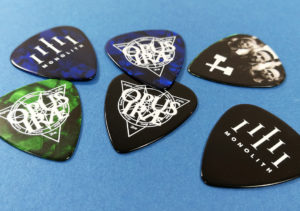 Custom printed green, blue and black guitar picks