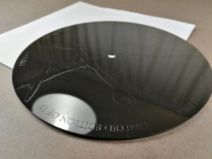 7" vinyl records with spot gloss UV LED printing on the reverse