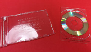 Business card CDs with UV LED on-body printing and spot gloss printing on the jewel case