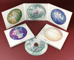 Six page CD digipaks with a single clear disc tray