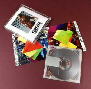 Clear MiniDiscs with jewel cases and full colour J-cards