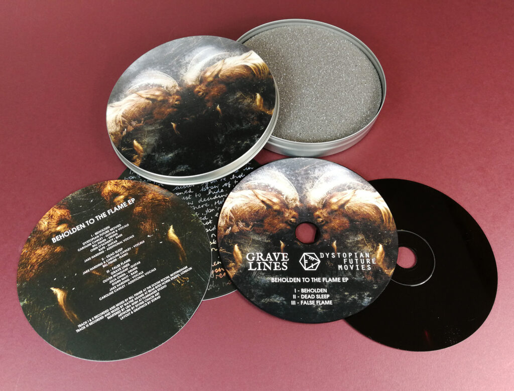 CD tins with full colour lid and base printing, plus two circular printed card inserts and UV-LED printed black base discs