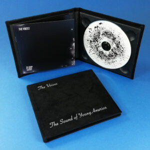 Black velvet hardback digipaks with white cover printing and booklets glued to the inner left panel