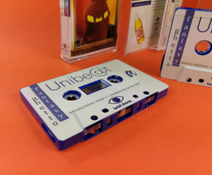 Dark blue cassette tapes with full colour on-body UV-LED printing in cases with J-cards