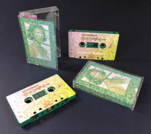 Jade green cassette tapes with full colour on-body UV-LED printing in cases with J-cards