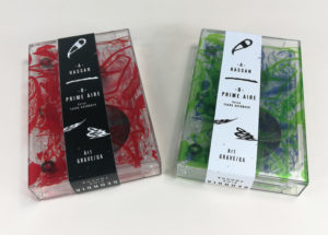 On-body printed cassettes in clear cases with full colour on-body printing and obi strips added