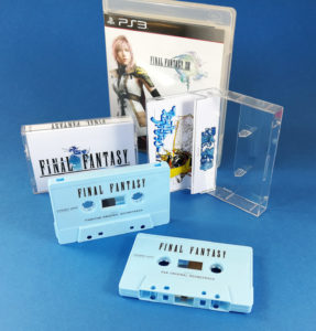 Sky blue cassette tapes with black on-body printing and printed J-cards