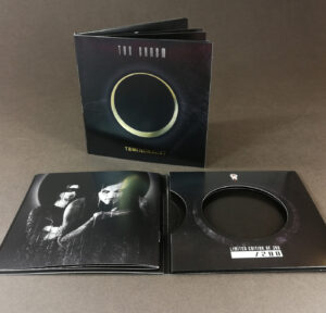 4 page double CD wallets with gold foil cover printing and a booklet glued into the inner left cover