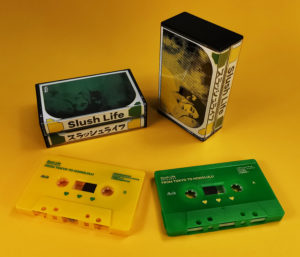 Double butterfly cassette tape set with yellow and green tape shells with on-body printing