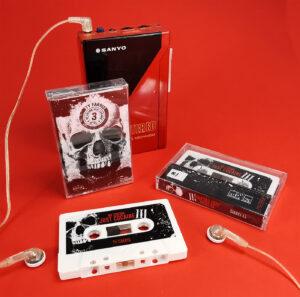 White cassette tapes with full colour sticker printing and J-cards in clear cases