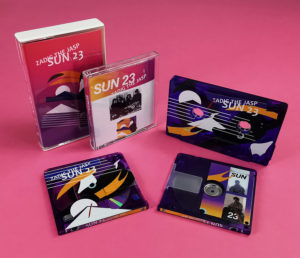Transparent purple cassette tapes and transparent purple MiniDiscs with custom partial printing