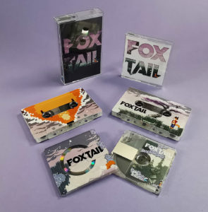 Cassettes and MiniDiscs with custom white base layers for unique reveals on the tapes and MiniDiscs