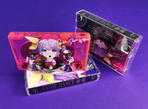 Transparent pink cassette tapes for on-body colour printing and gold foil printed J-cards