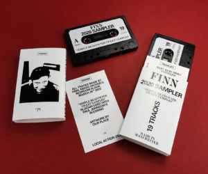 A rare narrow window Arkal black tape shell with sticker printing and O-cards with inserts