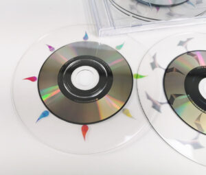 A double CD set with two full size 12cm CDs that only have an 8cm data ring and clear plastic outside