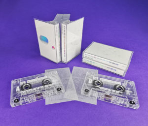 Double butterfly cassette set with holographic foil printed J-cards and tracing paper inserts