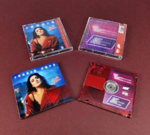Clear transparent MiniDiscs, printed with a red tint and full colour artwork