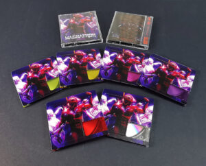 A set of six different colour printed MiniDiscs, using clear base discs and then printing transparent colour front windows and full colour backs of the MiniDiscs