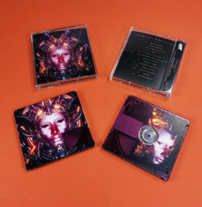 Clear MiniDiscs with partial white base layers, but full coverage colour prints to create a transparent purple disc, packed in jewel cases