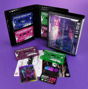 Quad tape black rave case with four tapes, all with on-body white printing and inserts that include holographic trading cards