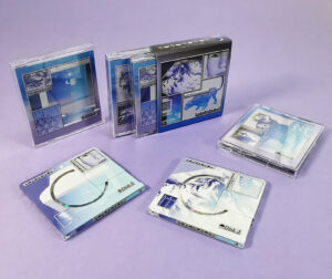 Double MiniDisc set with full coverage on-body printing, packed in clear cases with J-cards and an outer O-card