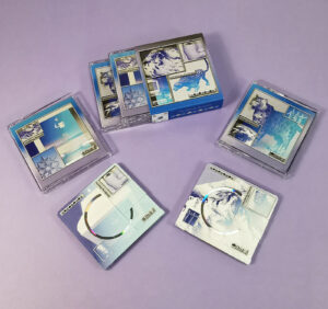 Double MiniDisc set with full coverage on-body printing, packed in clear cases with J-cards and an outer O-card