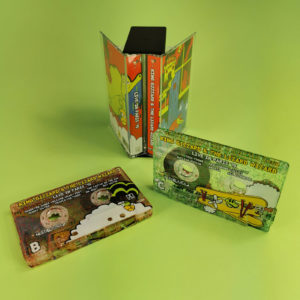 Double cassette set green and yellow glitter tapes in double butterfly cases with a black spine