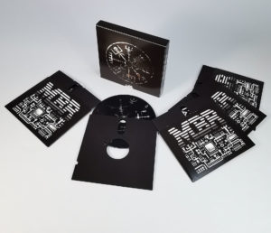 Five disc custom box set in the style of an old 5.25" floppy disc set, with inner wallets custom cut like a floppy