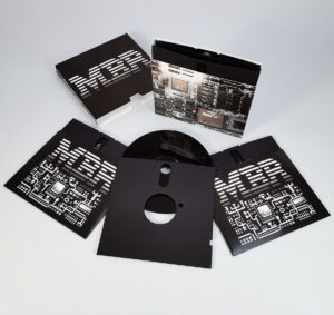 Five disc custom box set in the style of an old 5.25" floppy disc set, with inner wallets custom cut like a floppy