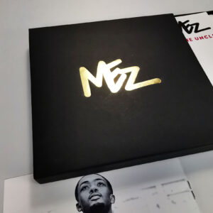 Black CD matchboxes with a gold foil print, eight page booklets and printed CDs