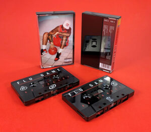 Black cassette shells with black and red on-body print in black cases with clear front, and full colour 2 panel J-cards