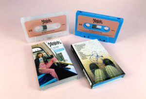 Recycled clear frosted and blue cassette shells with sticker printing in full colour printed O-cards