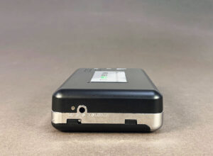 Portable stereo cassette tape player (left side)