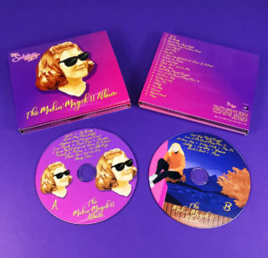 6 page digipak with two disc trays and booklet pocket with poster booklet, plus 4/4 printing and gloss lamination