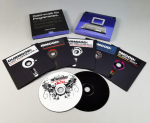 Five disc custom box set in the style of an old 5.25" floppy disc set, with inner wallets custom cut like a floppy