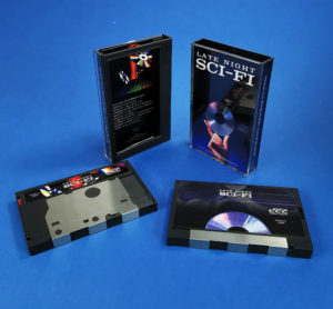 Black DCC digital cassettes with full colour on-body prints, packed in DCC slipcases with custom printed inserts