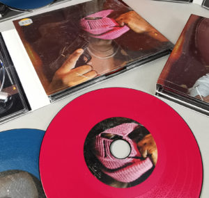 Six page CD digipaks with three disc trays and three custom printed vinyl-style CDs