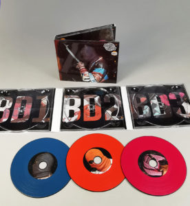 Six page CD digipaks with three disc trays and three custom printed vinyl-style CDs