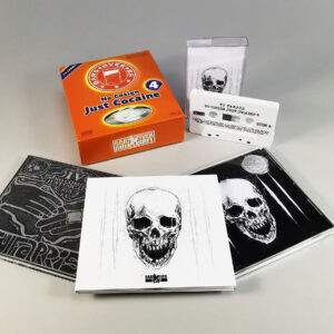 Custom 'soda box' set with three CDs in digipaks and a jewel case, plus a cassette tape