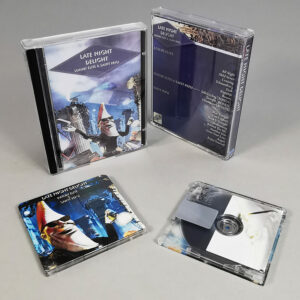 Clear MiniDiscs with full colour front and back print in full size cases with 8 panel roll fold insert